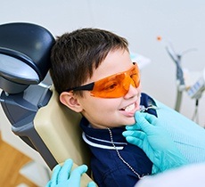 Little boy receiving dental exam