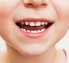 Closeup of child's healthy smile