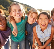 Group of children smiling in Garland