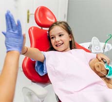 Child receiving dental exam