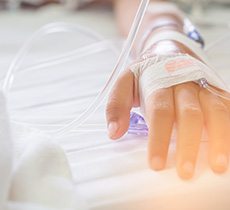 Child’s hand with an IV in it