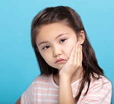 Little girl with toothache, may need pulp therapy