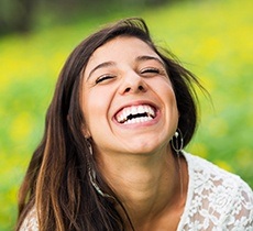 Smiling young woman outdoors