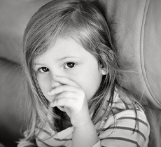 Girl sucking her thumb in Garland