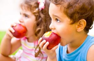 Boy and girl eating