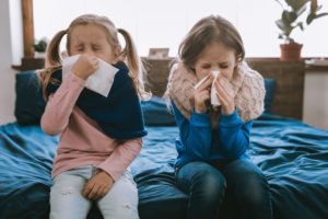 little girls brushing their teeth