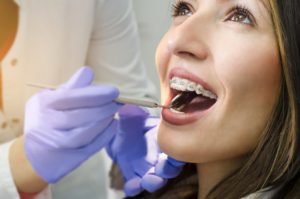 teen girl getting dental exam