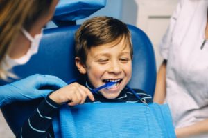 little boy seeing pediatric dentist