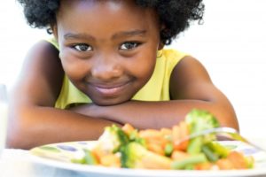 child eating healthy foods