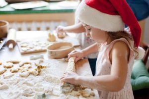 child baking holiday foods