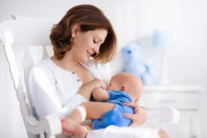 mom breastfeeding her baby who was treated for a lip or tongue tie